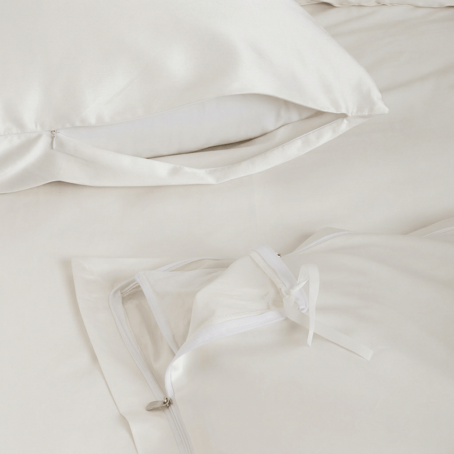 Ivory Easy Change duvet cover zip detail with corner tie, and pillowcase side zip